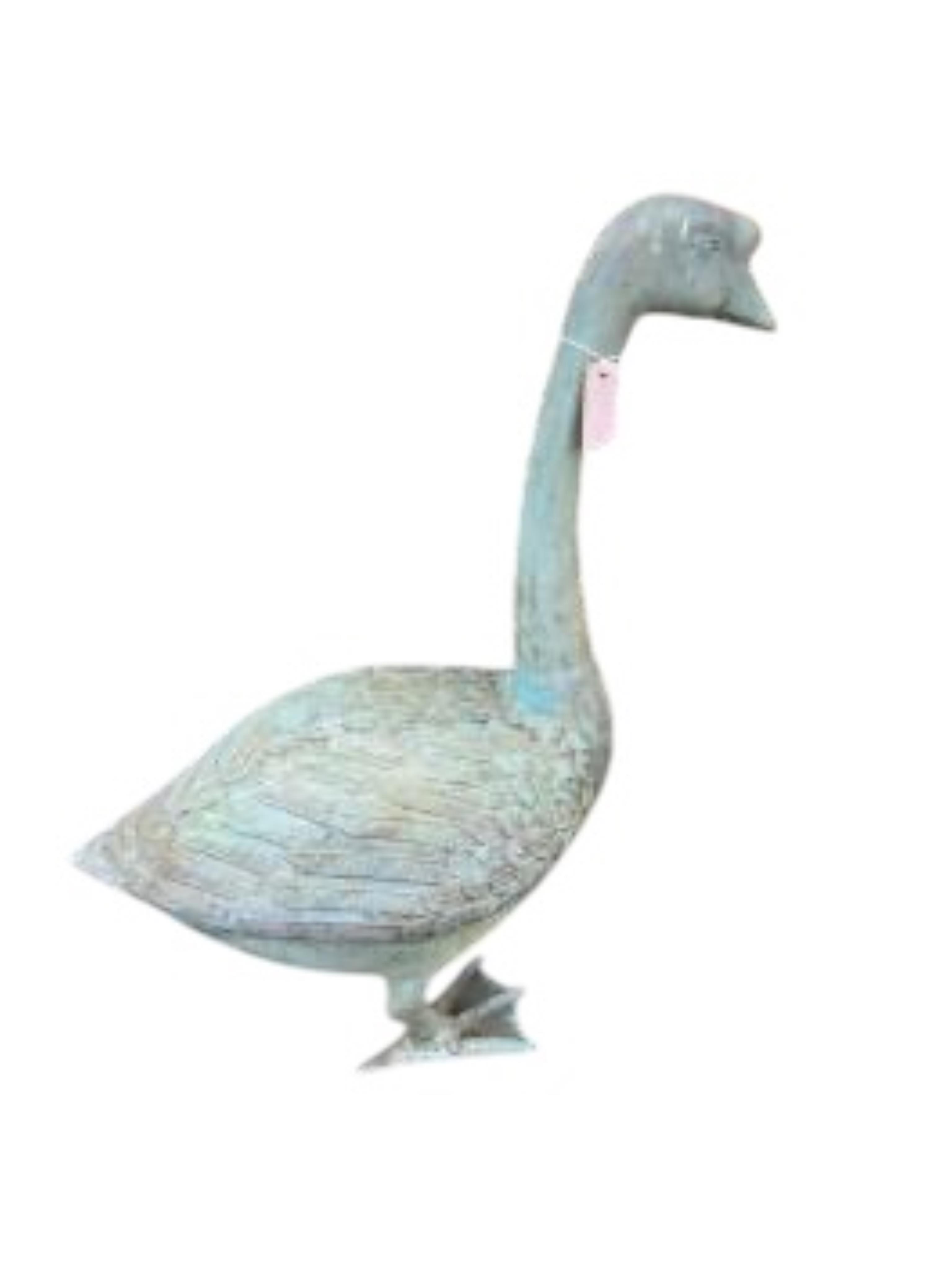 A cast patinated metal model of a goose, height 76cm